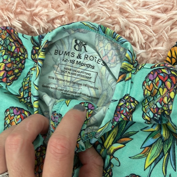 12-18 month Bums and Roses zip up footie pajamas. Excellent used condition. - Picture 7 of 13